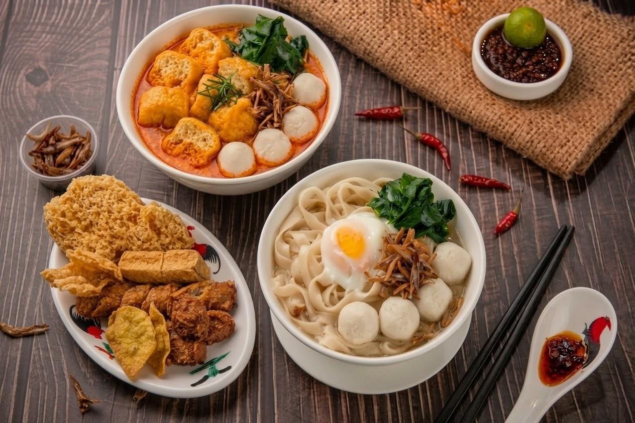 Ms Chin curry and soup ban mian bowls with a ngoh hiang platter